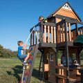 Backyard Discovery Canyon Creek Cedar Wood Swing Set with Wave Slide, Clubhouse, Play Kitchen, Picnic Area, Swings and Rock Wall